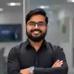 Arjun Varma satisfied customer testimonial photo showing genuine appreciation for luxury pen quality and craftsmanship